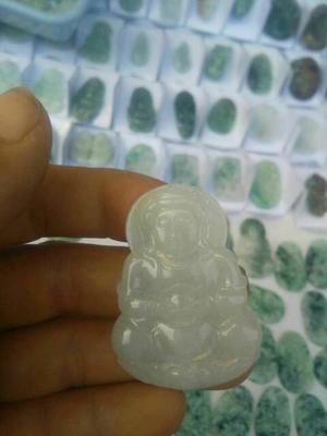 求懂行的老师鉴定下我的玉石证书的真伪。然后对玉石进行评估。证书编号:020118151105762